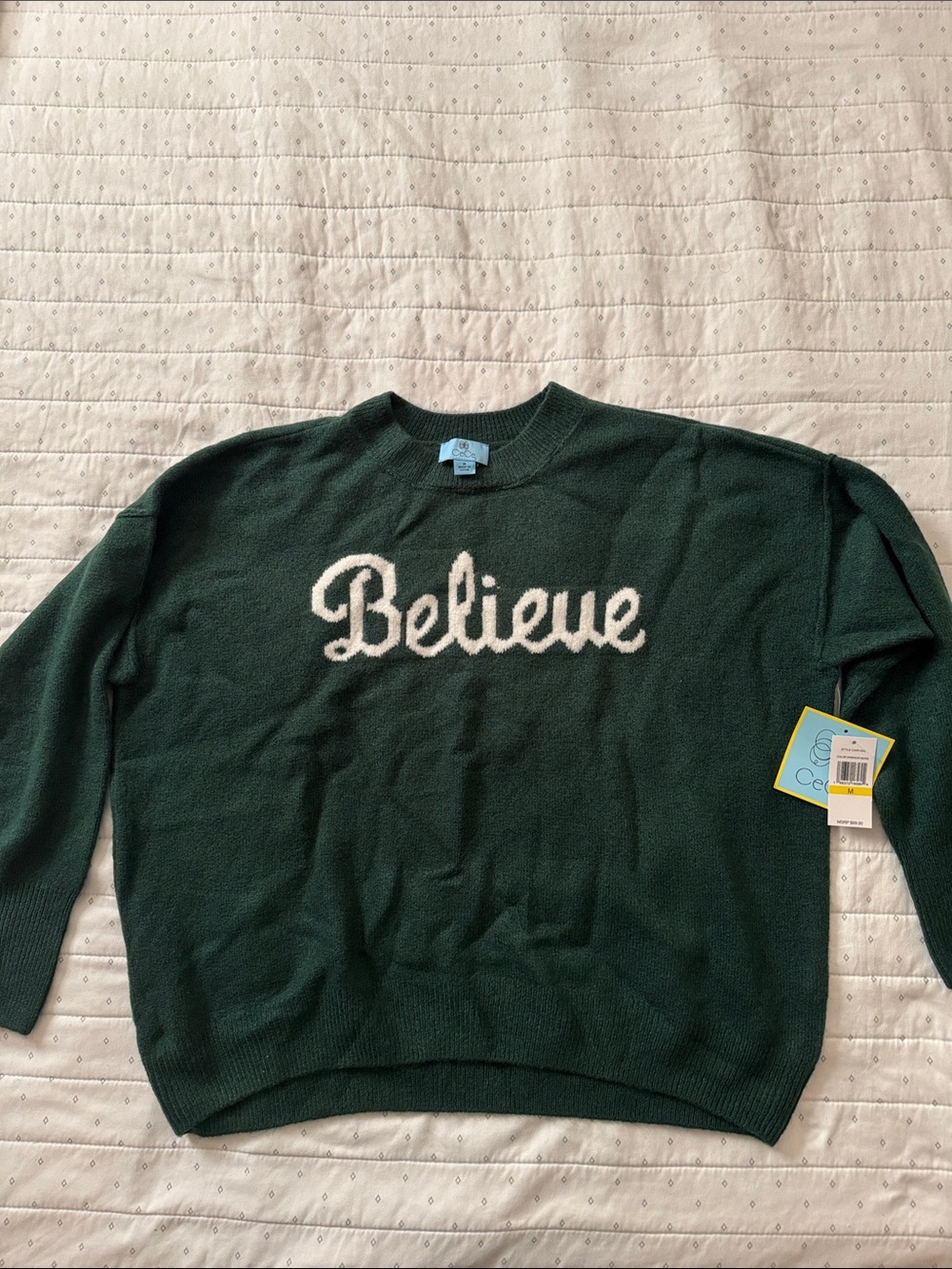 CeCe Dark Green Crewneck Sweater with White "Believe" Script